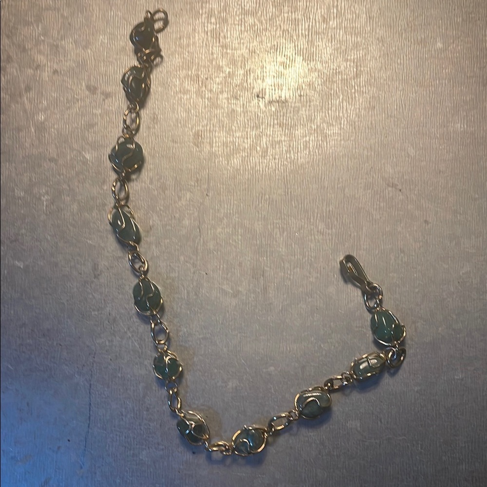 Elegant Gold and Green Bracelet